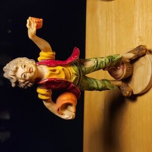 Vintage hand-painted polymer figurine marked "ITALY" on the base.